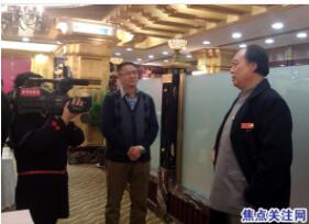 主任白万省与特型演员李志江共同接受北京电视台采访